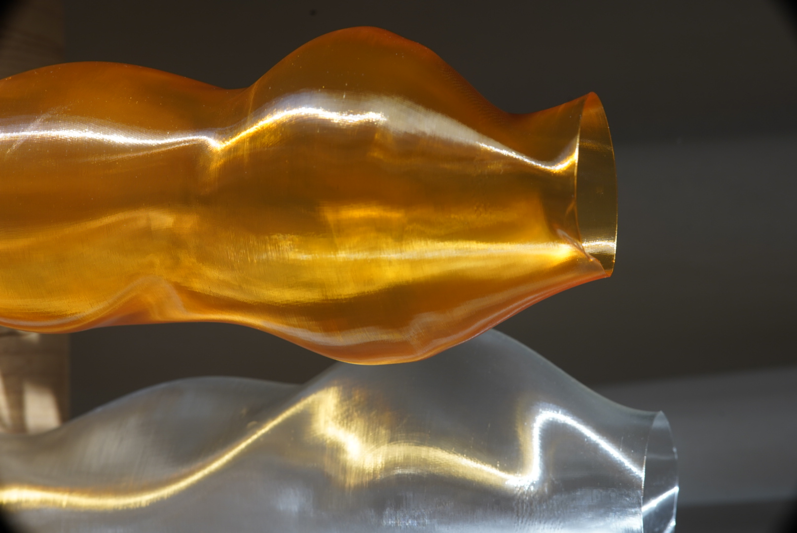 Golden and clear vases with lighting